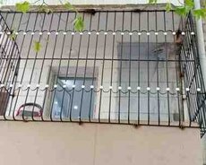 Dəmir barmaqlıqlar