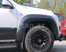 Volkswagen Amarok qanad artırmaları